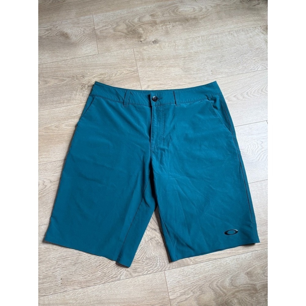 EUC Mens Oakley performance fit teal hybrid shorts water wicking stretch size 32